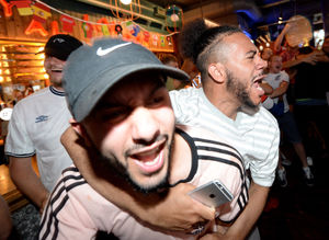 Fans celebrate England going 1-0 up at the Royal London pub, Wolverhampton
