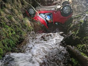 Supporting image for story: Trapped driver rescued after car overturns into stream near Talgarth