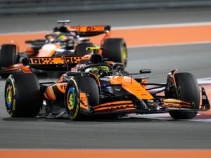 McLaren driver Lando Norris leads his teammate Oscar Piastri
