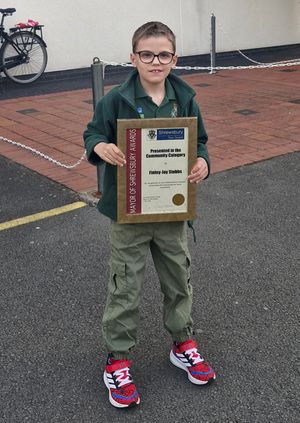Finlay with his award from the Mayor
