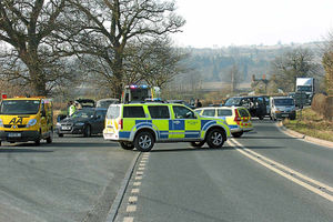 Police vehicles block off the road