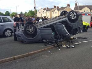 Supporting image for story: Five in hospital after car flips on roof in Bushbury