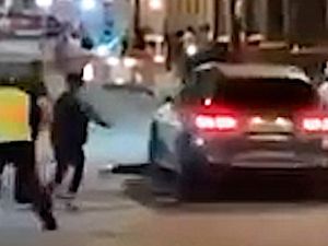 Supporting image for story: Shock footage shows a thug driver facing jail ploughing a Mercedes into a crowd outside a Birmingham nightclub during a Freshers' night