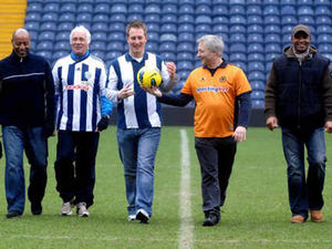 Supporting image for story: Rival fans pitch in for charity