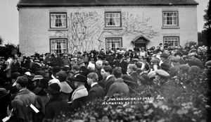 5 The crowd watching the dedication of Prees war memorial.