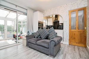 A generous lounge flowing into the kitchen-diner, creating a bright and sociable living area