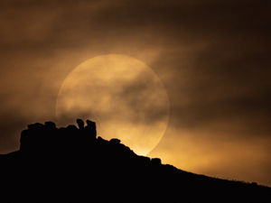 A blue moon is caught over Caer Caradoc in late 2020