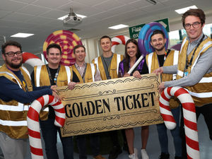 Supporting image for story: Amazon staff go for gold for children's charity