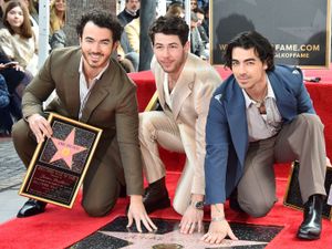 Supporting image for story: Jonas Brothers announce new album release date and tour at Walk Of Fame ceremony