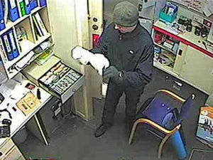 Supporting image for story: Man wanted in connection with armed robberies