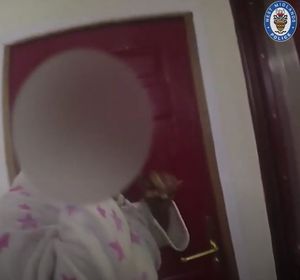 Someone answered the door to police in a dressing gown but with earrings on