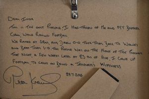 The message written on the back of the framed programme given to Wolves fan Ivor Roberts