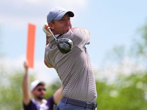 Rory McIlroy hits on the fourth hole during the first round of the Truist Championship