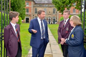 Nick with pupils Will Cuhls, 14, Kieran Powell, 13, and Molly Morgan, 17
