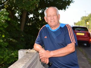 Shifnal resident, John Northwood, watches as an abnormal transformer load heads into Telford