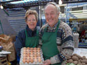 Supporting image for story: Market man Geoff hanging up apron