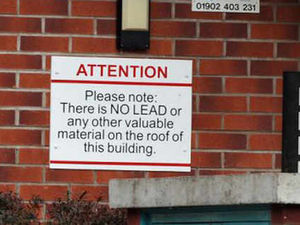 Supporting image for story: Surgery puts up sign to deter metal raiders