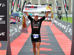 Supporting image for story: VIDEO and PICTURES: Competitors take on rainy Ironman 70.3 challenge in Staffordshire