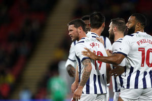 John Swift celebrates after levelling the scores (Photo by Adam Fradgley/West Bromwich Albion FC via Getty Images).
