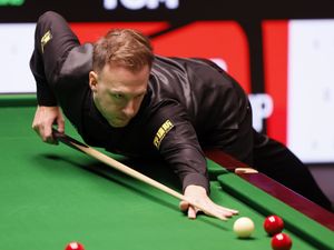 Judd Trump takes a shot