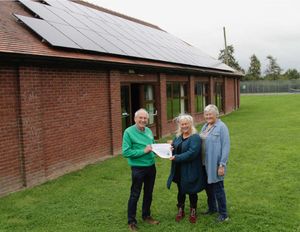Left to right: Howard Betts of Shropshire & Telford Community Energy, Grace Sandels vice-chair of Rushbury Village Hall committee, Christine Beaver, chair of Rushbury Village Hall committee