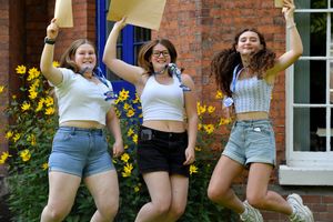Shrewsbury College students Bella Healey, Rosie Finlayson and Sophie Worton jump for joy after receiving their A-level results