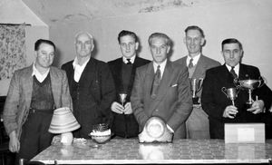 Lionel, second from right, with fellow pigeon racers from the Bridgnorth area. Phyl and her sister Elaine can partly identify some of the others. Third from right is Mr Holloway – Elaine thinks his full name might be Stan Holloway – who had a hairdressing business called Retonax in High Town and Low Town. The man far right had only one eye and drove a bus. Third from left is Ken Knowles from Alveley, and the surname of the person second from left is thought to be Delo. The picture is undated.
