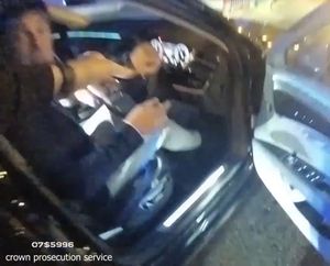 The moment police opened the door to see Saunders behind the wheel. Footage: CPS