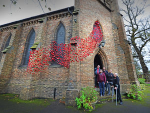 Supporting image for story: Stunning waterfall of Remembrance poppies at Dudley church