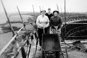Picture taken by an unknown photographer during work to build the cooling towers at Ironbridge Power Station in about 1966. Picture supplied by Mrs Lorna Steventon. Her husband Jim Steventon was a charge hand on the job, which was a two-year contract. Jim is centre. Left is Greta Millward, and right is unknown. Lorna thinks Greta lived in Broseley. She says both women worked in the office at the power station and just went up to the top of the tower. 