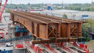 A skidding system - with a jacking push/pull mechanism - was used alongside the SPMTs to move a HS2 bridge into place across Lawley Middleway, Birmingham, West Midlands.