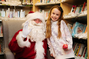  Santa and Libbie Owen 9 at Market Drayton library's Christmas party