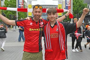 Walsall fans soak up the atmosphere on Wembley way before the kick off of the League Two play-off final