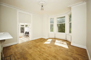 The downstairs hall that leads to the conservatory. Photo: Purple Bricks