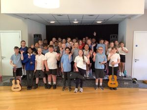 Supporting image for story: Dudley school children take their music show on the road