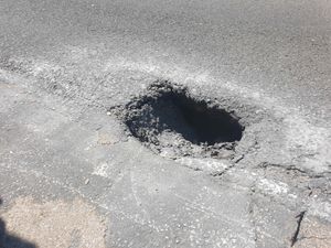Supporting image for story: Kidderminster road shut after hole opens up