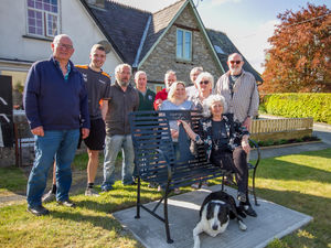 Tania Szabo, daughter of war hero Violette Szabo, with other residents enjoying 'The Cilmery Bench' at the VE Day commemorations in the village 