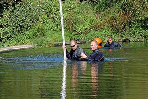 Supporting image for story: Divers take a close look at historic Ludlow weir