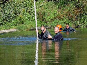 Supporting image for story: Divers take a close look at historic Ludlow weir