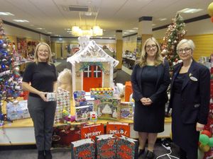 Supporting image for story: Lichfield opticians spreads Christmas cheer with toy donation