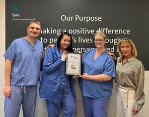 Spire Little Aston Hospital theatre colleagues and Hospital Director showcasing their NJR award certificate