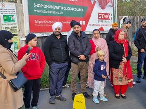 Families waited on the side of the road to be part of the parade
