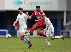 Andy Owens of AFC Telford United and Carl Rodgers of Altrincham