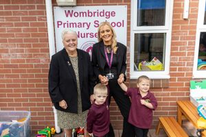 Councillor Shirley Reynolds (left) with Eileen Solomon, Headteacher at Wombridge Primary School, with nursery children. Pic: Telford & Wrekin Council