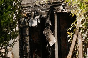 The fire raged through the property, with four people being injured