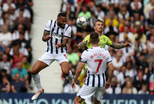 Kyle Bartley gets up to win a header (Photo by Adam Fradgley/West Bromwich Albion FC via Getty Images).