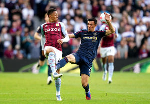 Burnley's Jack Cork (right) and Aston Villa's Jacob Ramsey battle for the ball
