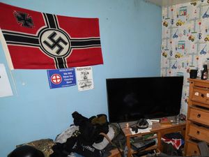 A nazi flag in the bedroom of Brogan Stewart