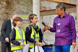 James Penney, 11, and Zara Gough, 10, from Shrewsbury Cathedral Catholic Primary School chatting to the BBC's Paul Shuttleworth