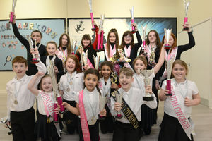 Mia Tokia, 6 and 10-year-old Alex Jackson, centre, pictured with other members of the Irish Dance Team at Studio J Dance after their recent national success